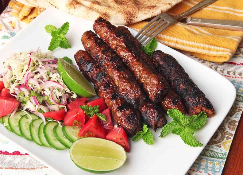 Seekh kebab with naan and chutney is a Pakistani in China.