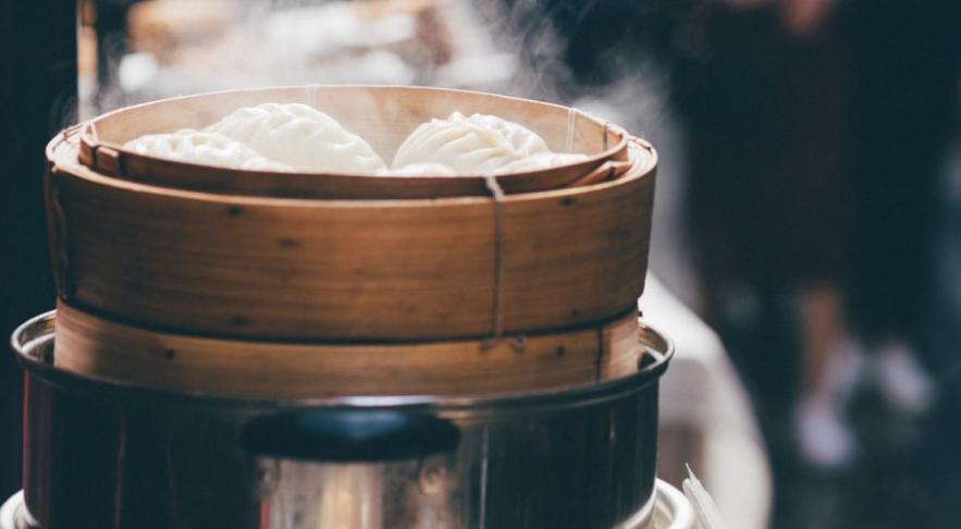 Steaming food by using bamboo steamers