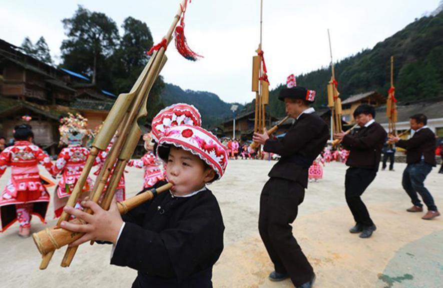 The Miao people are playing Lushengs in the Lusheng Festival.