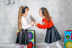 two little girl friends sing dance concept childhood lifestyle dance music two little girl friends sing dance 114800728